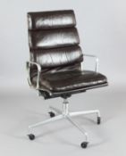 A Charles and Ray Eames EA216 'soft pad' high back swivel armchair, aluminium frame covered with