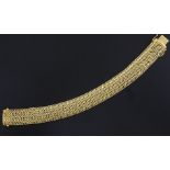 An 18ct gold woven link bracelet, 7.25in.