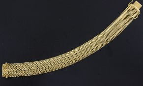 An 18ct gold woven link bracelet, 7.25in.