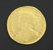 A Queen Anne gold guinea 1714, obv. scratch to bust otherwise F, rev. NVF