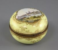 A Meissen yellow ground trinket box and cover, 19th century, painted with a titled view of