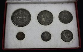 A George V 'New Types' specimen coin set 1927, toning and spotting otherwise UNC.