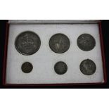 A George V 'New Types' specimen coin set 1927, toning and spotting otherwise UNC.