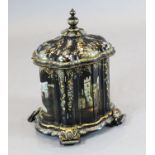 A Victorian papier mache combined jewellery and needlework casket, painted and inlaid with mother of