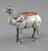 An Edwardian novelty silver pin cushion modelled as a camel by Adie & Lovekin, Birmingham, 1907, (