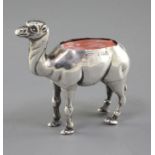 An Edwardian novelty silver pin cushion modelled as a camel by Adie & Lovekin, Birmingham, 1907, (