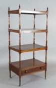 A Regency mahogany four tier whatnot, with ring turned columns and base drawer, W.2ft D.1ft 6in. H.