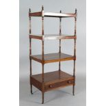 A Regency mahogany four tier whatnot, with ring turned columns and base drawer, W.2ft D.1ft 6in. H.