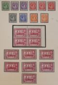 A mint and used accumulation of British Empire stamps on leaves and stockcards including Basutoland,