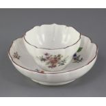 A Chelsea petal lobed tea bowl and saucer, c.1755, each painted with floral sprays and insects,
