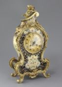 An early 20th century French ormolu and champlevé enamel mantel clock, with Cupid surmount and J.