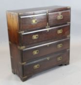 A small late 19th century brass bound teak military chest, of two short and three long drawers, W.