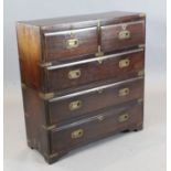 A small late 19th century brass bound teak military chest, of two short and three long drawers, W.