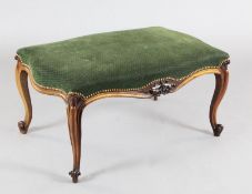 A Victorian rosewood dressing stool, with serpentine seat and cabriole legs, W.1ft 10in. D.1ft 11in.