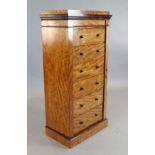 A Victorian satinwood Wellington style chest, of six drawers, with side locking bar, W.2ft D.1ft