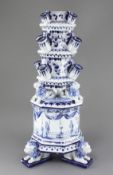 A Delft tulip vase or flower pyramid, possibly 18th century, the octagonal base raised on three