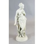 Emile-André Boisseau (1842-1923). A carved white marble figure of a classical maiden standing beside