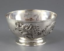 A late 18th/early 19th century Chinese Export silver circular bowl by Cumshing, Canton, with applied