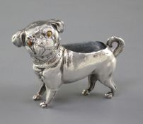 A George V novelty silver pin cushion modelled as a pug by Crisford & Morris, with tiger's eye