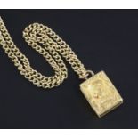 A Victorian chased gold rectangular double locket pendant on a later 9ct gold chain, the locket