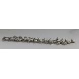 A set of twelve Art Deco style English pewter knife rests, modelled as animals, 4.5in.