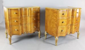 A pair of serpentine maple wood commodes, by Hille, London, each with three short and two long