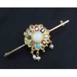 An Indian gold, enamel and multi gem set bar brooch, including white opal, garnet and sapphire, (
