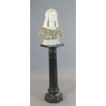 An early 20th century marble and alabaster bust of an Arab youth, on rectangular plinth, with an