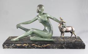 P. Hugonnet. An Art Deco bronze group of a maiden and a fawn, on variegated marble plinth, width