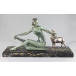 P. Hugonnet. An Art Deco bronze group of a maiden and a fawn, on variegated marble plinth, width