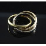 A 1990's three colour 18ct gold triple band "Russian Wedding" ring, 10.2 grams, size F.