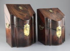 Two George III mahogany knife boxes, each with matrix interiors and serpentine fronts, height 12.