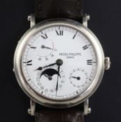 A gentleman's 18ct white gold Patek Philippe 'Officer's' wrist watch, model 5054G-001, the white