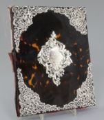 A late Victorian tortoiseshell and pierced silver mounted blotter by William Comyns, with