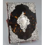 A late Victorian tortoiseshell and pierced silver mounted blotter by William Comyns, with