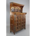 A Victorian Aesthetic Movement decorated oak chiffonier designed by A.W.Blomfield and illustrated in