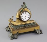 A 19th century French bronze and ormolu timepiece, modelled with a frog riding a snail, height 5.