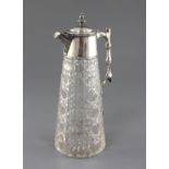 A late Victorian silver mounted cut glass claret jug by Goldsmiths & Silversmiths Co. Ltd, or