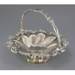 An early Victorian silver fruit basket, with foliate scroll border and similar engraved