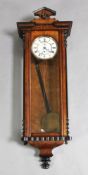 A 19th century walnut and ebonised Vienna wall timepiece, in architectural case, H.44in.