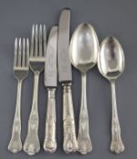 A 1960's/1970's canteen of silver double struck Kings pattern cutlery for twelve in a mahogany