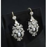A pair of Victorian gold and silver, diamond and pearl cluster drop earrings, of pierced scrolling