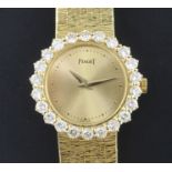 A lady's 1980's 18ct gold and diamond Piaget manual wind wrist watch, the dial with dot markers
