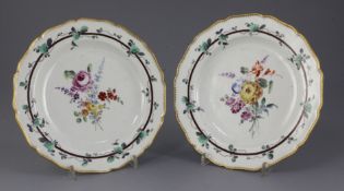 A pair of Worcester Sheridan pattern plates, c.1770, painted in the London studio of James Giles