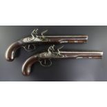 A pair of late 18th century flintlock holster pistols, with octagonal barrels and locks signed