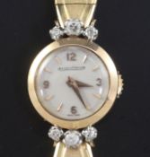 A lady's 18ct gold and diamond Jaeger le Coultre manual back winding cocktail watch, with baton