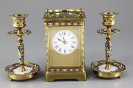 An early 20th century Ricard & Co brass hour repeating carriage clock, with champleve enamel