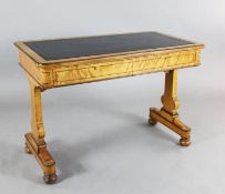 An early Victorian birds-eye maple writing table, by Holland & Sons, with tooled black leather