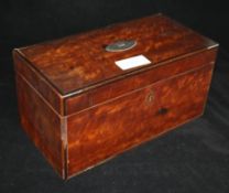 A tea caddy and contents