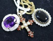 Three 9ct gold and gem set pendants.